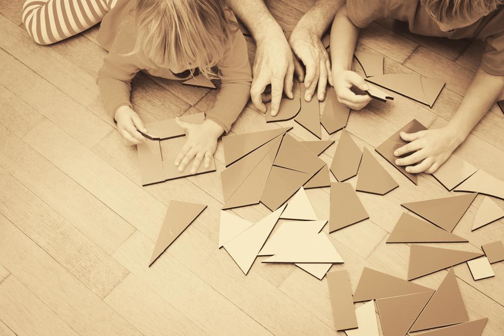 Children playing with forms similar to Phonolook panels